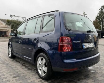 Синий Фольксваген Туран, объемом двигателя 1.4 л и пробегом 203 тыс. км за 7822 $, фото 2 на Automoto.ua