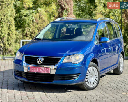 Синий Фольксваген Туран, объемом двигателя 1.4 л и пробегом 260 тыс. км за 6750 $, фото 2 на Automoto.ua