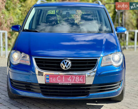 Синий Фольксваген Туран, объемом двигателя 1.4 л и пробегом 260 тыс. км за 6750 $, фото 7 на Automoto.ua