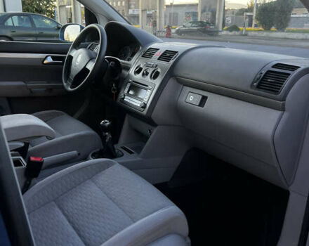 Синий Фольксваген Туран, объемом двигателя 1.4 л и пробегом 205 тыс. км за 7299 $, фото 17 на Automoto.ua