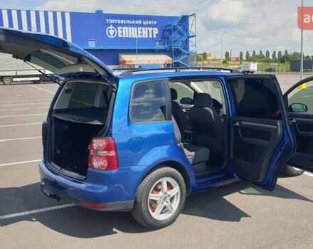 Синій Фольксваген Туран, об'ємом двигуна 1.4 л та пробігом 280 тис. км за 5888 $, фото 4 на Automoto.ua
