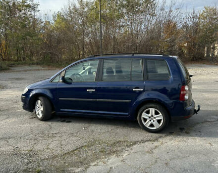 Синий Фольксваген Туран, объемом двигателя 1.4 л и пробегом 237 тыс. км за 6000 $, фото 5 на Automoto.ua