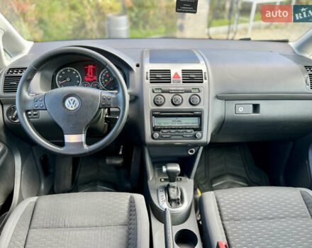 Синий Фольксваген Туран, объемом двигателя 1.4 л и пробегом 260 тыс. км за 6750 $, фото 54 на Automoto.ua