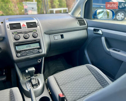 Синий Фольксваген Туран, объемом двигателя 1.4 л и пробегом 260 тыс. км за 6750 $, фото 58 на Automoto.ua