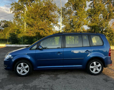 Синий Фольксваген Туран, объемом двигателя 1.4 л и пробегом 205 тыс. км за 7299 $, фото 3 на Automoto.ua