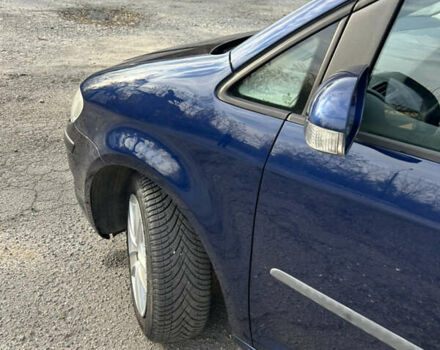 Синий Фольксваген Туран, объемом двигателя 1.4 л и пробегом 237 тыс. км за 6000 $, фото 28 на Automoto.ua