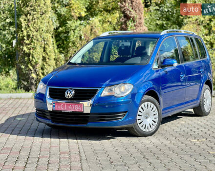 Синий Фольксваген Туран, объемом двигателя 1.4 л и пробегом 260 тыс. км за 6750 $, фото 5 на Automoto.ua