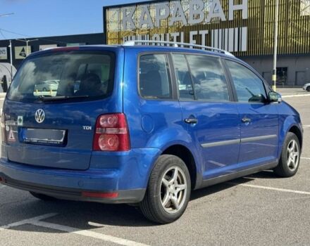 Синий Фольксваген Туран, объемом двигателя 1.9 л и пробегом 230 тыс. км за 4500 $, фото 2 на Automoto.ua