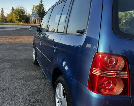 Синий Фольксваген Туран, объемом двигателя 1.4 л и пробегом 205 тыс. км за 7299 $, фото 1 на Automoto.ua