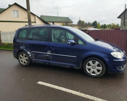 Синий Фольксваген Туран, объемом двигателя 2 л и пробегом 244 тыс. км за 5350 $, фото 2 на Automoto.ua