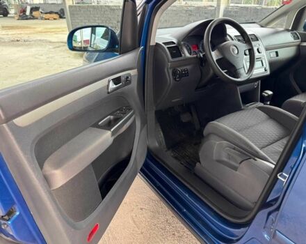 Синий Фольксваген Туран, объемом двигателя 1.4 л и пробегом 241 тыс. км за 6399 $, фото 7 на Automoto.ua