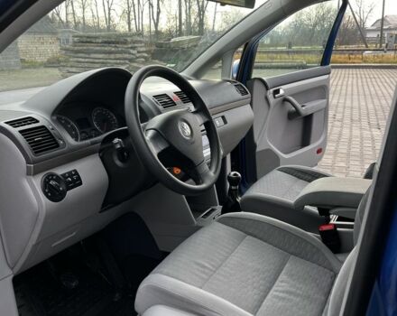 Синій Фольксваген Туран, об'ємом двигуна 1.4 л та пробігом 208 тис. км за 6899 $, фото 3 на Automoto.ua