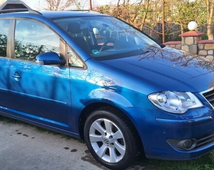 Синий Фольксваген Туран, объемом двигателя 1.9 л и пробегом 250 тыс. км за 7500 $, фото 1 на Automoto.ua