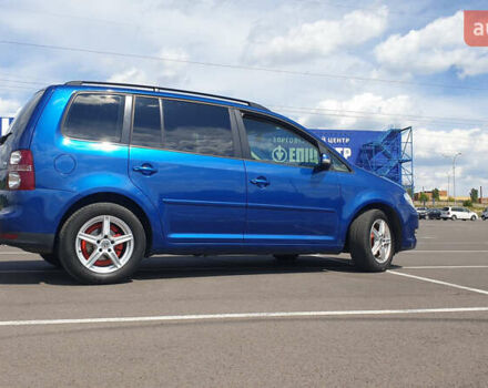 Синій Фольксваген Туран, об'ємом двигуна 1.4 л та пробігом 280 тис. км за 5888 $, фото 1 на Automoto.ua