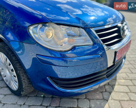 Синий Фольксваген Туран, объемом двигателя 1.4 л и пробегом 260 тыс. км за 6750 $, фото 29 на Automoto.ua