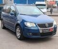 Синий Фольксваген Туран, объемом двигателя 1.4 л и пробегом 224 тыс. км за 6490 $, фото 4 на Automoto.ua