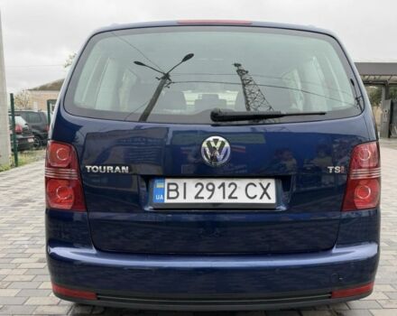 Синий Фольксваген Туран, объемом двигателя 1.4 л и пробегом 203 тыс. км за 7822 $, фото 3 на Automoto.ua