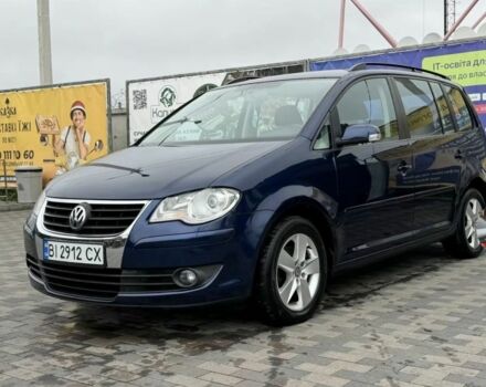 Синий Фольксваген Туран, объемом двигателя 1.4 л и пробегом 203 тыс. км за 7822 $, фото 1 на Automoto.ua