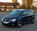 Синій Фольксваген Туран, об'ємом двигуна 2 л та пробігом 255 тис. км за 8400 $, фото 1 на Automoto.ua