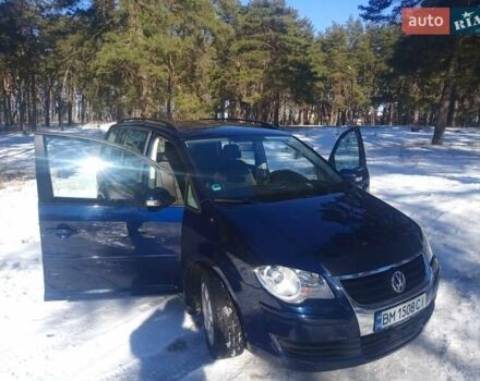 Синий Фольксваген Туран, объемом двигателя 1.4 л и пробегом 205 тыс. км за 7500 $, фото 3 на Automoto.ua