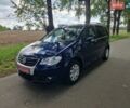 Синій Фольксваген Туран, об'ємом двигуна 2 л та пробігом 245 тис. км за 6999 $, фото 1 на Automoto.ua