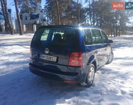 Синий Фольксваген Туран, объемом двигателя 1.4 л и пробегом 205 тыс. км за 7500 $, фото 8 на Automoto.ua