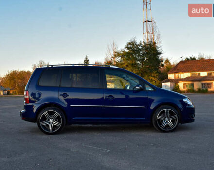 Синій Фольксваген Туран, об'ємом двигуна 2 л та пробігом 255 тис. км за 8400 $, фото 7 на Automoto.ua