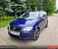 Синий Фольксваген Туран, объемом двигателя 1.6 л и пробегом 227 тыс. км за 7200 $, фото 1 на Automoto.ua