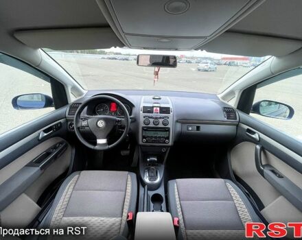 Синий Фольксваген Туран, объемом двигателя 1.4 л и пробегом 198 тыс. км за 6750 $, фото 9 на Automoto.ua