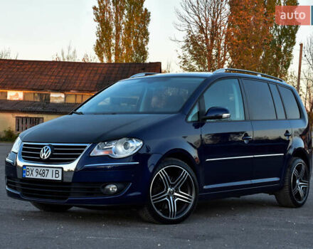 Синій Фольксваген Туран, об'ємом двигуна 2 л та пробігом 255 тис. км за 8400 $, фото 1 на Automoto.ua