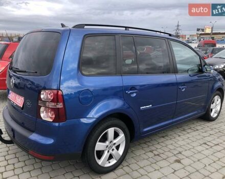 Синий Фольксваген Туран, объемом двигателя 1.6 л и пробегом 209 тыс. км за 7598 $, фото 1 на Automoto.ua