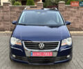 Синий Фольксваген Туран, объемом двигателя 1.4 л и пробегом 229 тыс. км за 6500 $, фото 1 на Automoto.ua