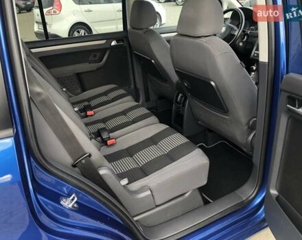 Синий Фольксваген Туран, объемом двигателя 1.6 л и пробегом 209 тыс. км за 7598 $, фото 49 на Automoto.ua