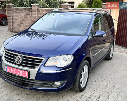 Синий Фольксваген Туран, объемом двигателя 1.4 л и пробегом 229 тыс. км за 6500 $, фото 2 на Automoto.ua
