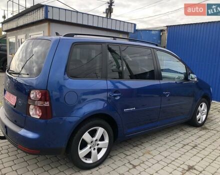 Синий Фольксваген Туран, объемом двигателя 1.6 л и пробегом 209 тыс. км за 7598 $, фото 24 на Automoto.ua