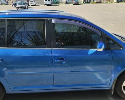 Синий Фольксваген Туран, объемом двигателя 1.9 л и пробегом 345 тыс. км за 7005 $, фото 3 на Automoto.ua