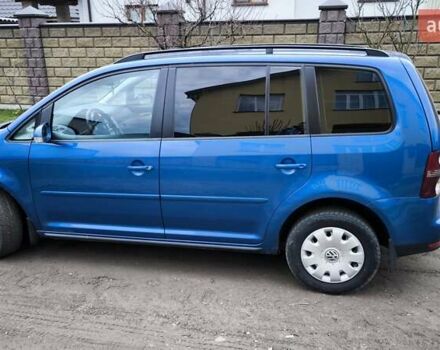 Синій Фольксваген Туран, об'ємом двигуна 2 л та пробігом 358 тис. км за 7500 $, фото 4 на Automoto.ua