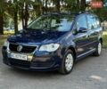 Синий Фольксваген Туран, объемом двигателя 1.4 л и пробегом 240 тыс. км за 5899 $, фото 1 на Automoto.ua