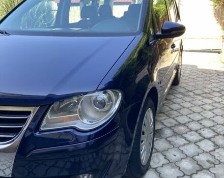 Синий Фольксваген Туран, объемом двигателя 2 л и пробегом 250 тыс. км за 7900 $, фото 1 на Automoto.ua
