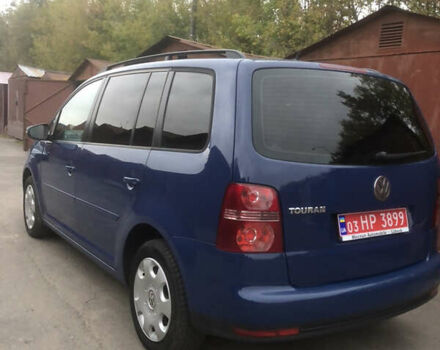 Синий Фольксваген Туран, объемом двигателя 1.6 л и пробегом 214 тыс. км за 7500 $, фото 1 на Automoto.ua