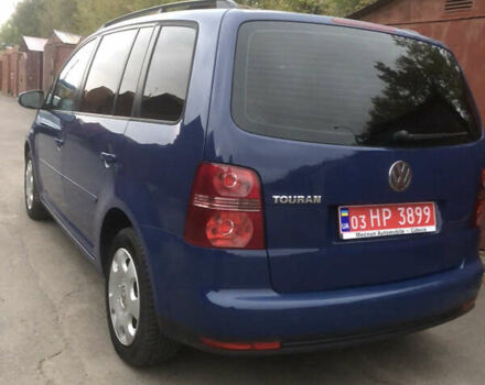 Синий Фольксваген Туран, объемом двигателя 1.6 л и пробегом 214 тыс. км за 7500 $, фото 4 на Automoto.ua