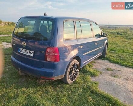 Синій Фольксваген Туран, об'ємом двигуна 1.9 л та пробігом 266 тис. км за 8200 $, фото 19 на Automoto.ua