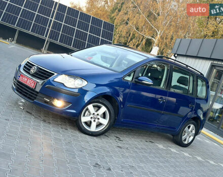 Синий Фольксваген Туран, объемом двигателя 1.4 л и пробегом 220 тыс. км за 7600 $, фото 4 на Automoto.ua