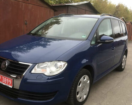 Синий Фольксваген Туран, объемом двигателя 1.6 л и пробегом 214 тыс. км за 7500 $, фото 2 на Automoto.ua