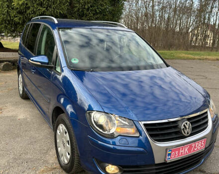 Синий Фольксваген Туран, объемом двигателя 1.4 л и пробегом 172 тыс. км за 8299 $, фото 3 на Automoto.ua