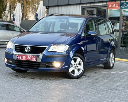 Синий Фольксваген Туран, объемом двигателя 1.4 л и пробегом 220 тыс. км за 7600 $, фото 82 на Automoto.ua