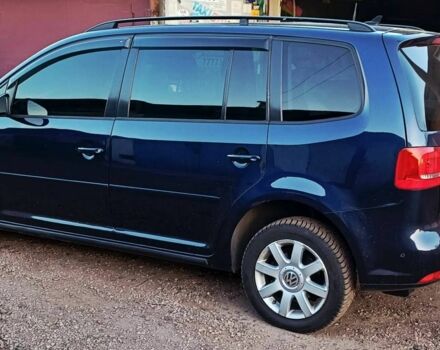 Синій Фольксваген Туран, об'ємом двигуна 1.4 л та пробігом 320 тис. км за 7500 $, фото 2 на Automoto.ua