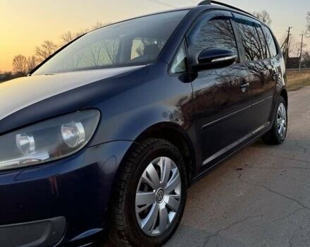 Фольксваген Туран 2011 в Днепре (Днепропетровске) на Automoto.ua Синий Фольксваген Туран, объемом двигателя 1.6 л и пробегом 230 тыс. км за 9000 $, фото 1 на Automoto.ua