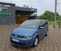 Синій Фольксваген Туран, об'ємом двигуна 1.2 л та пробігом 261 тис. км за 7500 $, фото 1 на Automoto.ua