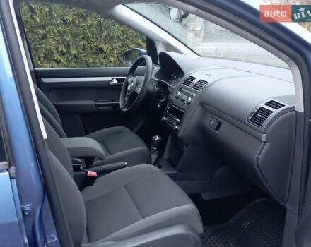 Синий Фольксваген Туран, объемом двигателя 1.2 л и пробегом 160 тыс. км за 7650 $, фото 38 на Automoto.ua